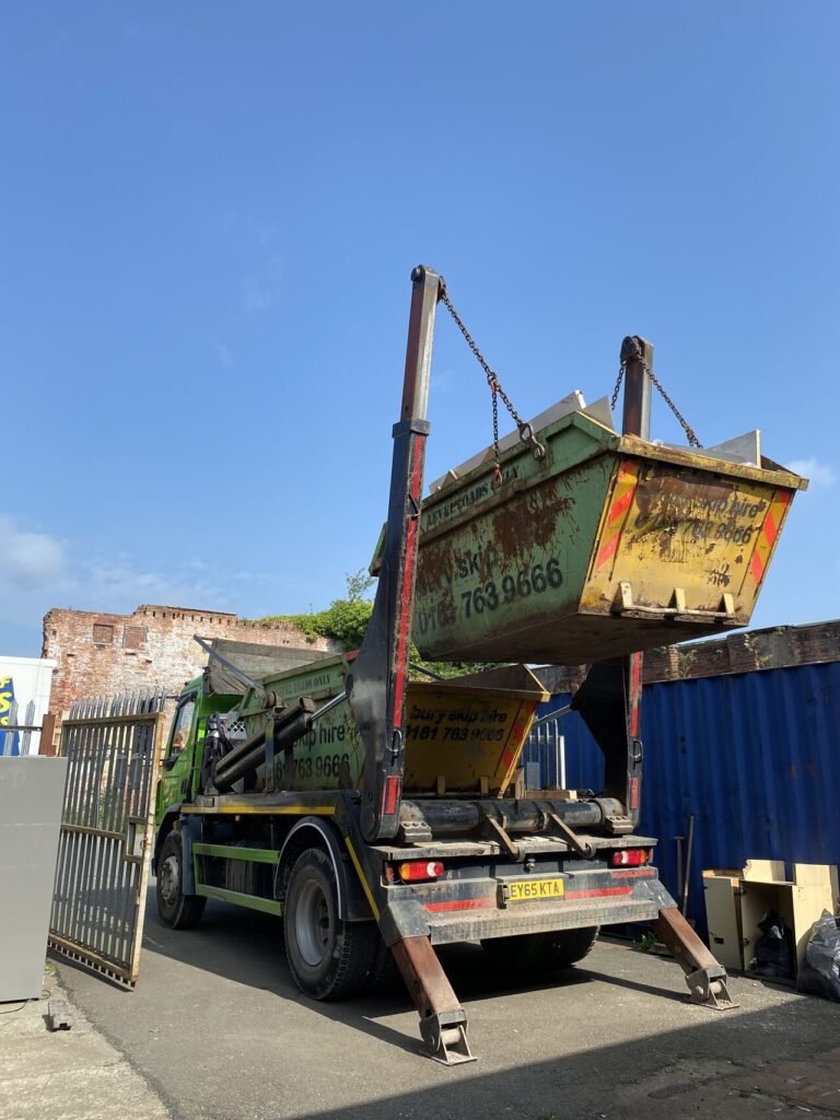 Bury Skip Hire Ltd exchanging a skip for another happy customer in Radcliffe